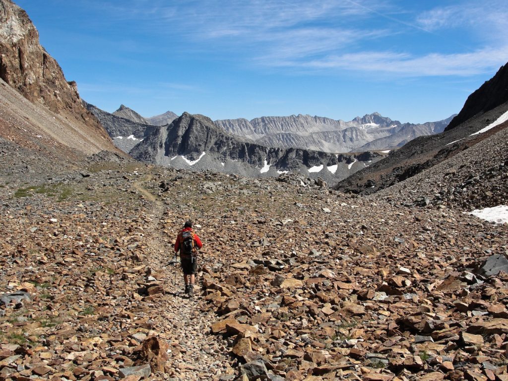 Hiker with a light pack below McGee Pass in the Sierra Nevada